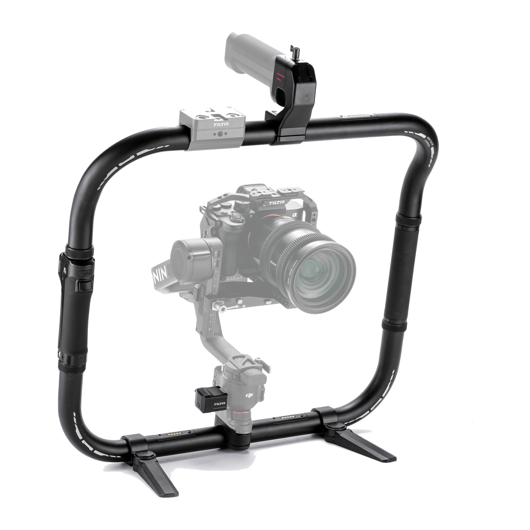 Tilta Basic Ring Grip Plus around a DJI Ronin gimbal (ghosted), top handle and feet, front three-quarter