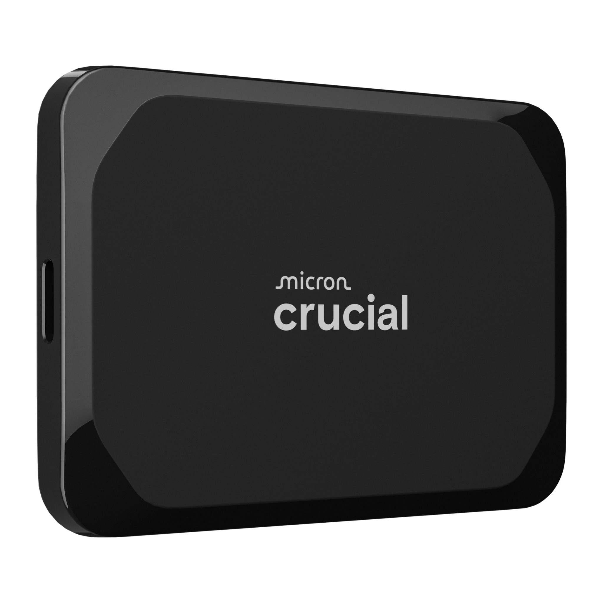 Crucial X9 2TB portable SSD, front three-quarter view showing the USB-C port on the side edge
